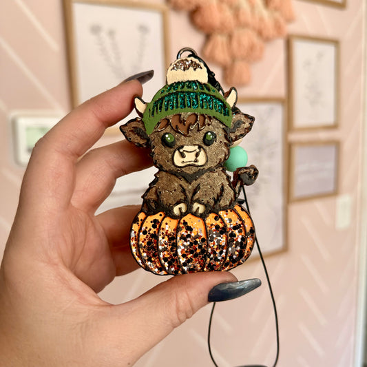 Cow sitting on pumpkin Freshie Mold